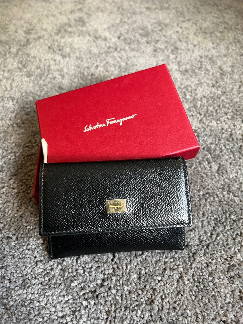 Salvatore Ferragamo Black Pebbled Leather Wallet with Gold Plaque